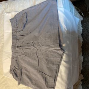 Olive gray short shorts with elastic waist band.